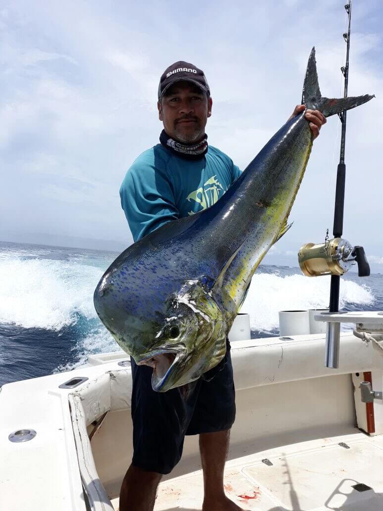 holding up the trophy fish catch